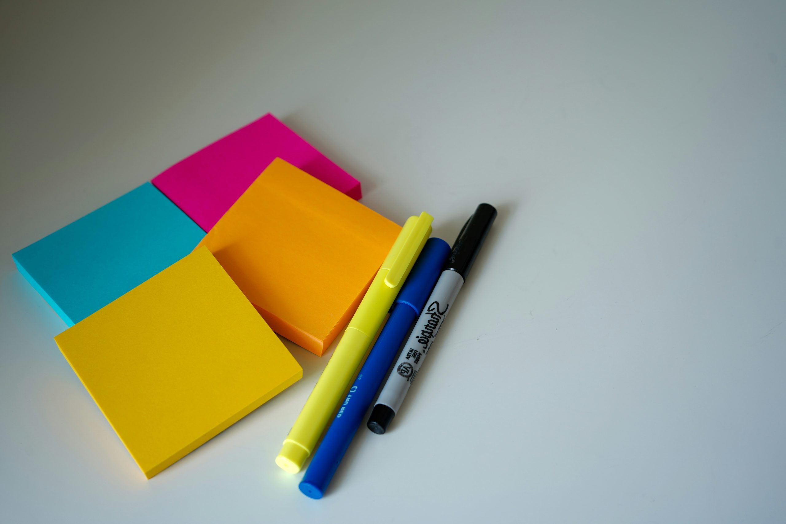 sticky notes and pens